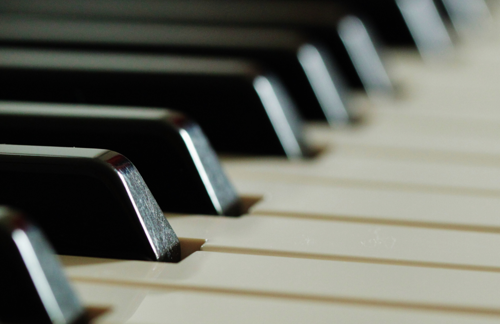 A close up photo of piano keys.